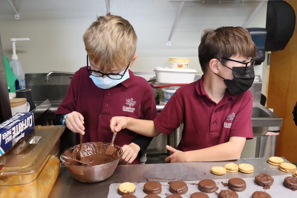 students learning baking skills